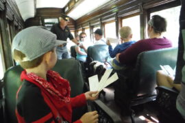 Boy awaits to have his tickets punched at the WW&F Railway in Alna, Maine. Boy awaits to have his tickets punched at the WW&F Railway in Alna, Maine.