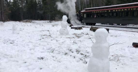 Wanna build a snowman while waiting for the train at the WW&F Railway in Alna, Maine.