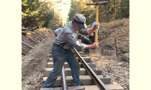 Driving Spikes Driving railroad spikes the old-fashioned way - by hand - at the WW&F Railway Museum in Alna, Maine.