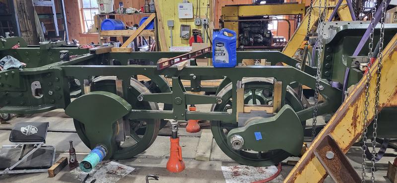 The driving wheels under the frame of locomotive 11.