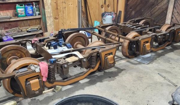 Coach 9's trucks Trucks (wheelsets) for Coach 9 being built by the volunteers of the WW&F Railway Museum in Alna, Maine.
