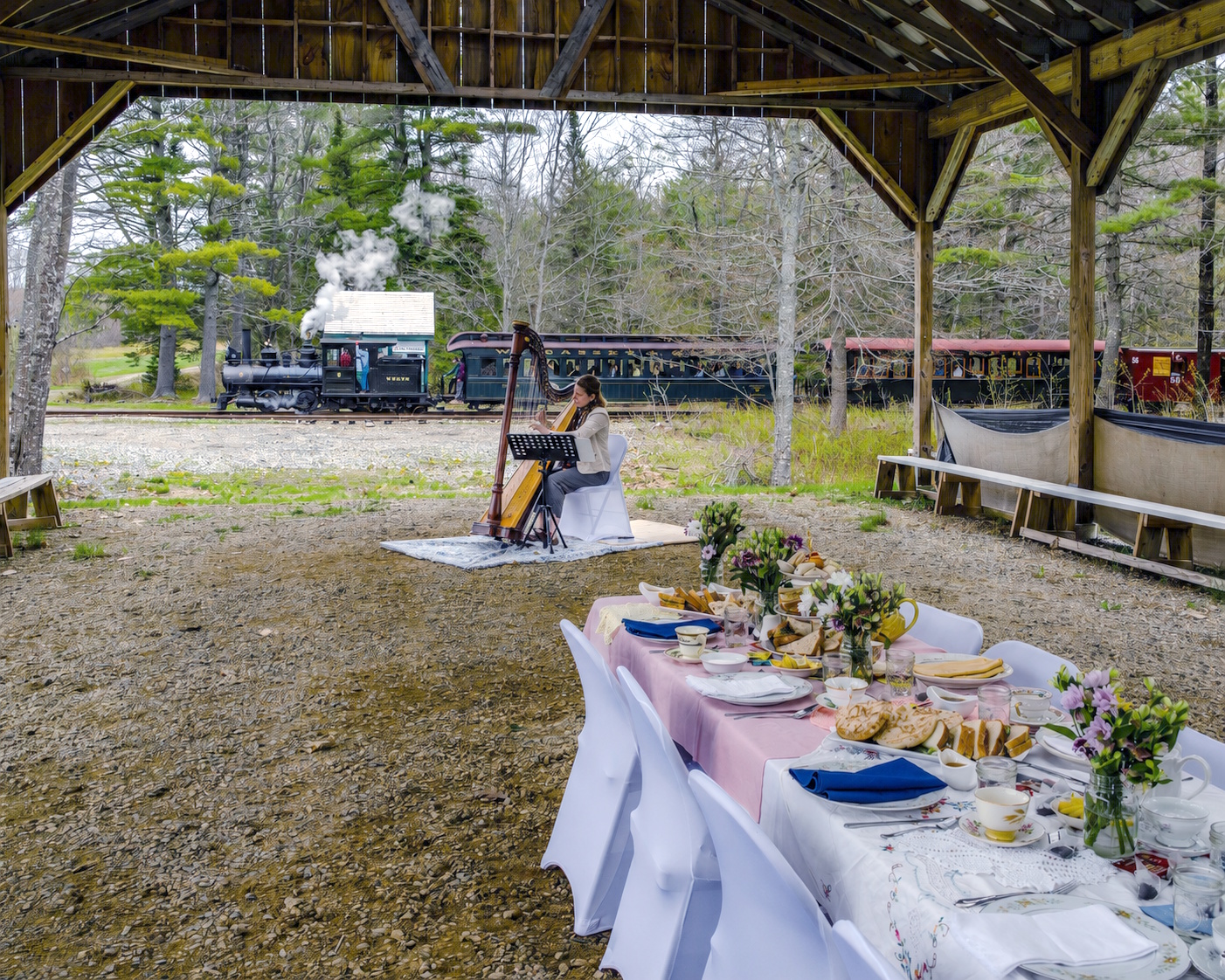 Guests arrive by train at an elegant event hosted at the WW&F Railway Museum in Alna, Maine.