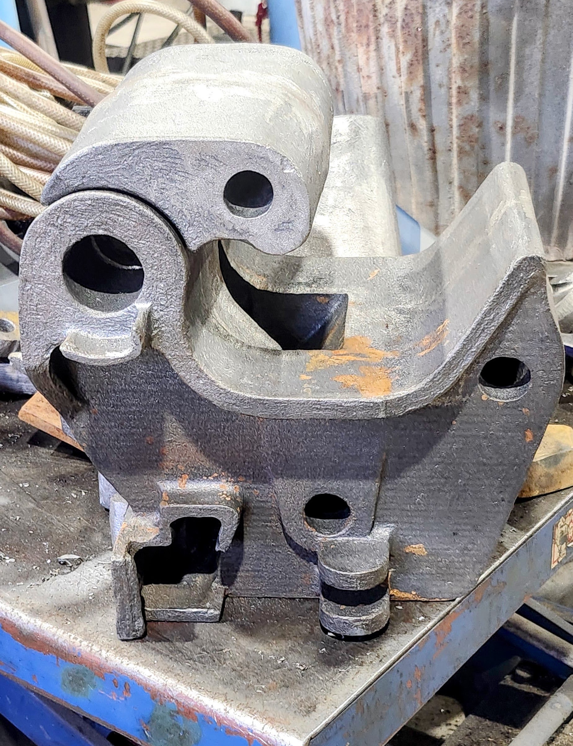 A partially assembled knuckle coupler adapter.